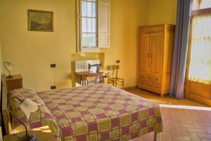 Postel nebo postele na pokoji v ubytování Villa Graziani
