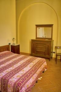 Postel nebo postele na pokoji v ubytování Villa Graziani
