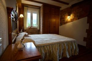 Ένα ή περισσότερα κρεβάτια σε δωμάτιο στο Casa Bedia +8 φωτογραφίες