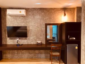 TV a/nebo společenská místnost v ubytování Nao Ta Chuang