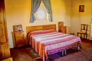 Postel nebo postele na pokoji v ubytování Villa Graziani