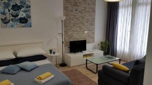 TV a/nebo společenská místnost v ubytování Guest House Adriatic