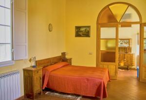 Postel nebo postele na pokoji v ubytování Villa Graziani