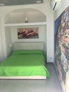 A bed or beds in a room at Casa Roberta