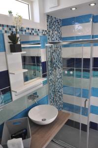 Kylpyhuone majoituspaikassa Casa Roberta