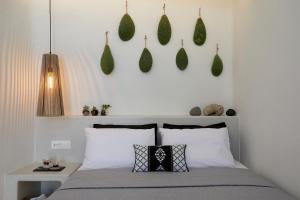 Letto o letti in una camera di Floria Suites
