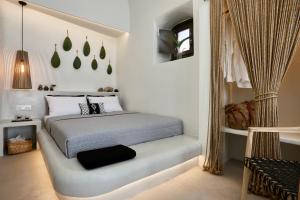 Letto o letti in una camera di Floria Suites