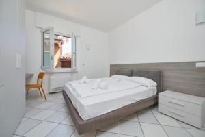 Llit o llits en una habitació de Appartamenti del Corso
