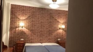 Postel nebo postele na pokoji v ubytování Hotel La Fuentecilla
