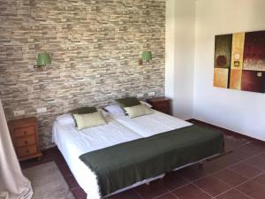 Postel nebo postele na pokoji v ubytování Hotel La Fuentecilla