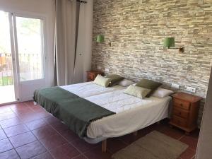 Postel nebo postele na pokoji v ubytování Hotel La Fuentecilla