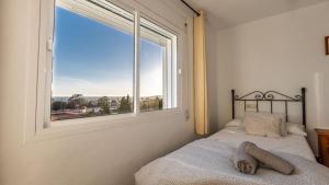Postel nebo postele na pokoji v ubytování Apartamento Luz C