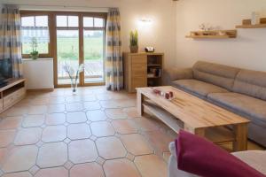 Posezení v ubytování Ferienwohnung Dreimaster W1