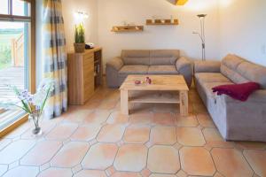 Posezení v ubytování Ferienwohnung Dreimaster W1