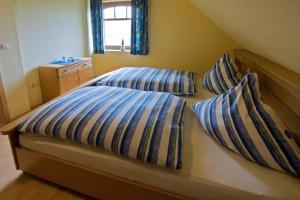 Postel nebo postele na pokoji v ubytování Ferienwohnung Dreimaster W1