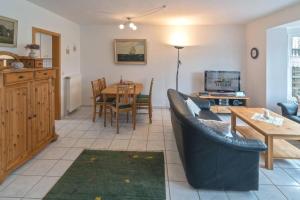 TV a/nebo společenská místnost v ubytování Ferienhaus Antje