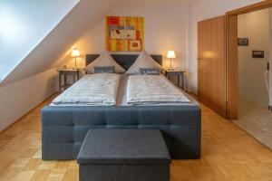 Postel nebo postele na pokoji v ubytování Ferienhaus Antje