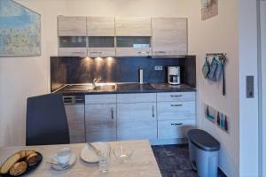 Kuchyň nebo kuchyňský kout v ubytování Ferienwohnung Asgard + 9 fotografií