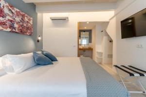 Postel nebo postele na pokoji v ubytování Hotel m - 27