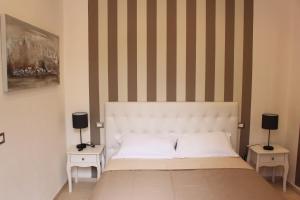 Postel nebo postele na pokoji v ubytování Maestrale Charme Rooms