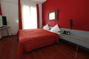 Postel nebo postele na pokoji v ubytování Hotel Hippel Krone