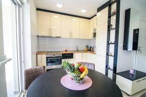 Kuchyň nebo kuchyňský kout v ubytování Lorena Luxury Apartment