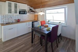 Η κουζίνα ή μικρή κουζίνα στο Ferienwohnung Kapitäns-Loft