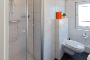 Ένα μπάνιο στο Ferienwohnung Kapitäns-Loft +13 φωτογραφίες