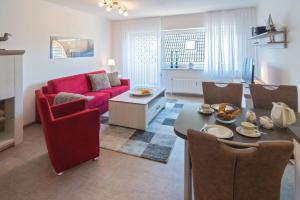 Posezení v ubytování Ferienwohnung Noatun