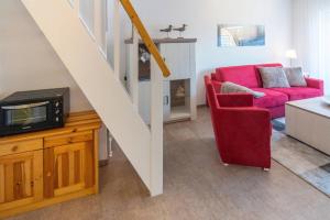 TV a/nebo společenská místnost v ubytování Ferienwohnung Noatun