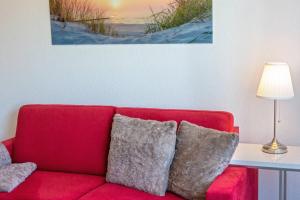 Posezení v ubytování Ferienwohnung Noatun