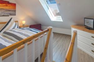 Postel nebo postele na pokoji v ubytování Ferienwohnung Noatun