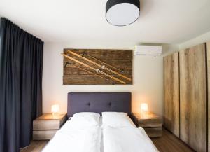 Posteľ alebo postele v izbe v ubytovaní Apartamenty Minimal House