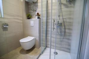 Koupelna v ubytování Lorena Luxury Apartment