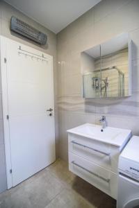 Koupelna v ubytování Lorena Luxury Apartment + 21 fotografií