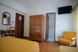 TV a/nebo společenská místnost v ubytování Gerês Guest House
