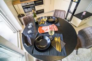 Kuchyň nebo kuchyňský kout v ubytování Lorena Luxury Apartment