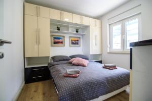 Postel nebo postele na pokoji v ubytování Lorena Luxury Apartment