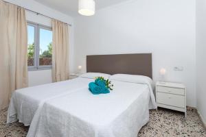 Postel nebo postele na pokoji v ubytování Villa Rosales + 15 fotografií
