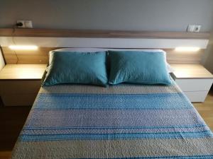 Кровать или кровати в номере Apartamentos San Roque