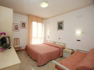 Postel nebo postele na pokoji v ubytování Albergo Bice