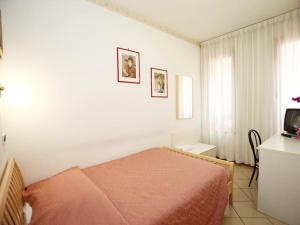 Postel nebo postele na pokoji v ubytování Albergo Bice