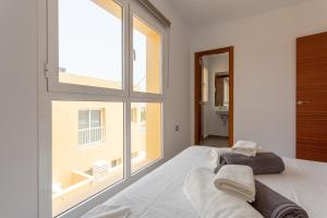Posteľ alebo postele v izbe v ubytovaní Mariposas Home Pool