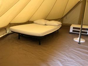 Postel nebo postele na pokoji v ubytování Camping Le Canoë