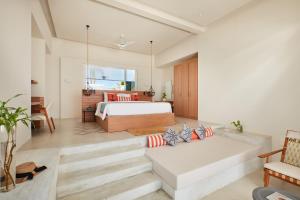Postel nebo postele na pokoji v ubytování Sun Siyam Iru Veli - 24 Hours Premium All-Inclusive with Free Transfers