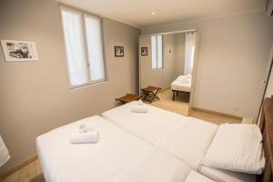 Posteľ alebo postele v izbe v ubytovaní Résidence Bouttau by Connexion