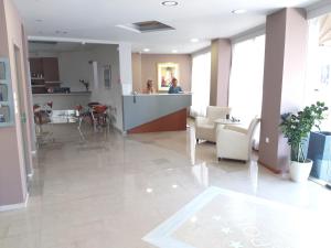Posezení v ubytování Apollo Hotel