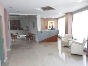 Kuchyň nebo kuchyňský kout v ubytování Apollo Hotel
