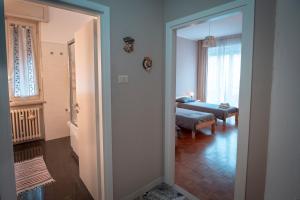 A bed or beds in a room at Civico 8 B&B - Appartamento