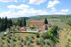 an aerial view of a house on a hill at Agriturismo Tenuta Cantagallo in Montelupo Fiorentino